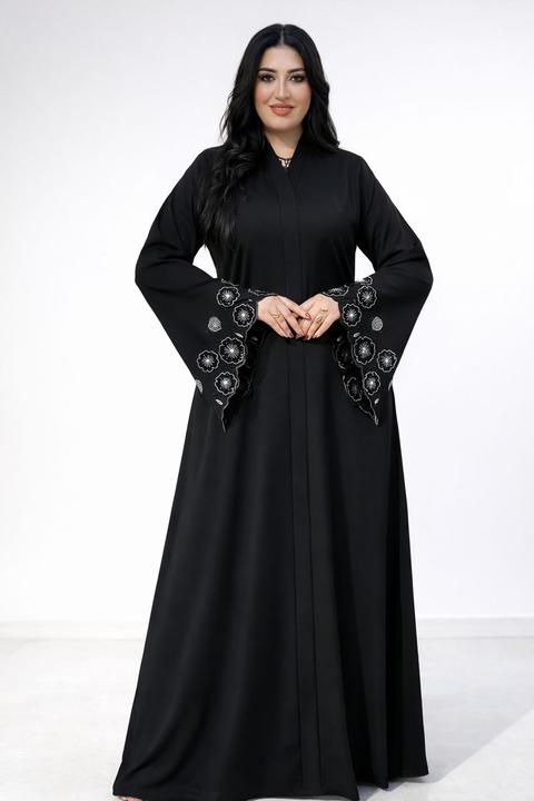 Abaya Noire Fleur d’Or – Élégance et Raffinement Absolu